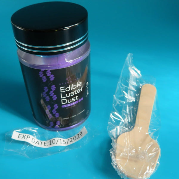 As I get older and more health conscious, I’m trying to be a more healthy eater as well as baker. Let’s face it though, every once in a while for aesthetics, we need a bit of razzle dazzle. This edible luster dust gives a bit of bling to ones baked goods but like everything else, I go with the a little goes a long way attitude. The color of this item is indeed a vibrant violet. As labeled, it really doesn’t have a taste or flavor. It’s meant to be edible décor. I was very pleased to see a little application spoon attached to the jar. It’s sealed in its own cellophane which again, I do appreciate. If one has used these types of food glitters before you’ll know that it can be tricky to get just what you need out of the jar without making a big mess. This little spoon will help with that. There are however several things which I would have liked to seen. While there is an expiration date sticker on the product (nice shelf life on this… a generous 4+ years from date of receipt), it is on the outer cellophane wrap of the product. Once you remove the cellophane, the jar no longer has the expiration date sticker on it. I would prefer the sticker be placed on the jar itself as then it would be more useful for the user. Secondly, nowhere on this jar do I see where this product was actually made. I feel that is a bit of a red flag for basic informational purposes.